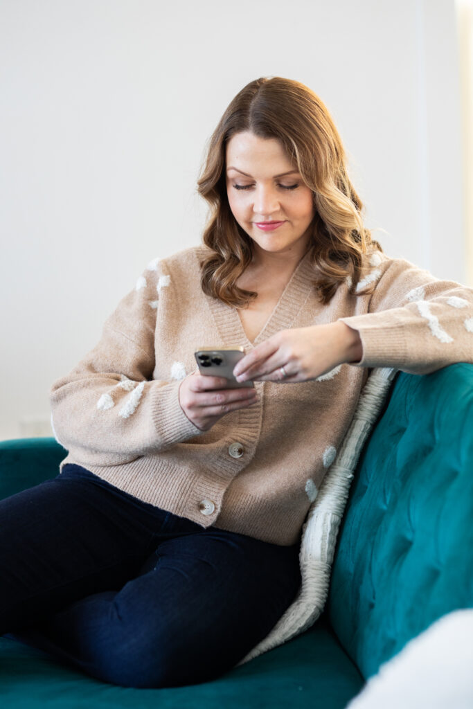 Casual branding photo of a real estate agent on her phone 